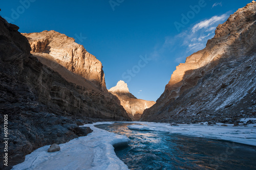 Frozen Zanskar river, with Indian Himalayas in background