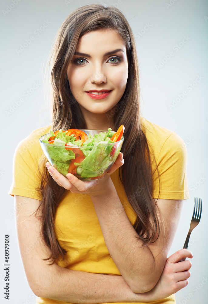 Woman diet concept portrait. Female model hold green salad. Woman diet concept portrait. Female model hold green salad.