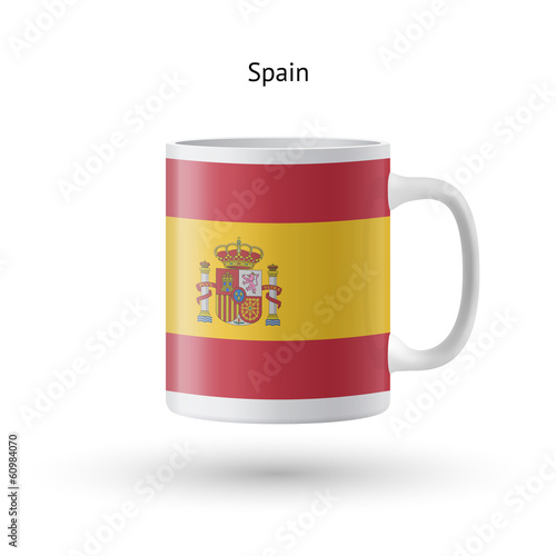 Spain flag souvenir mug on white background.
