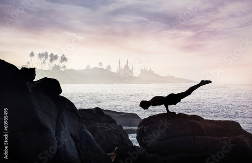 Yoga on the rock photo