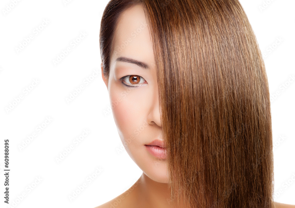 Naklejka premium Beautiful Thai woman with long elegant straight hair