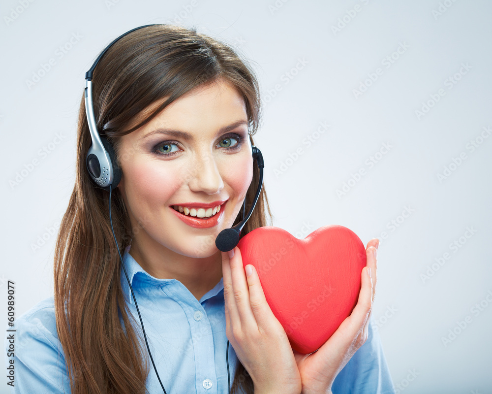 Woman call center operator hold love symbol Red heart. Close up Woman call center operator hold love symbol Red heart. Close up