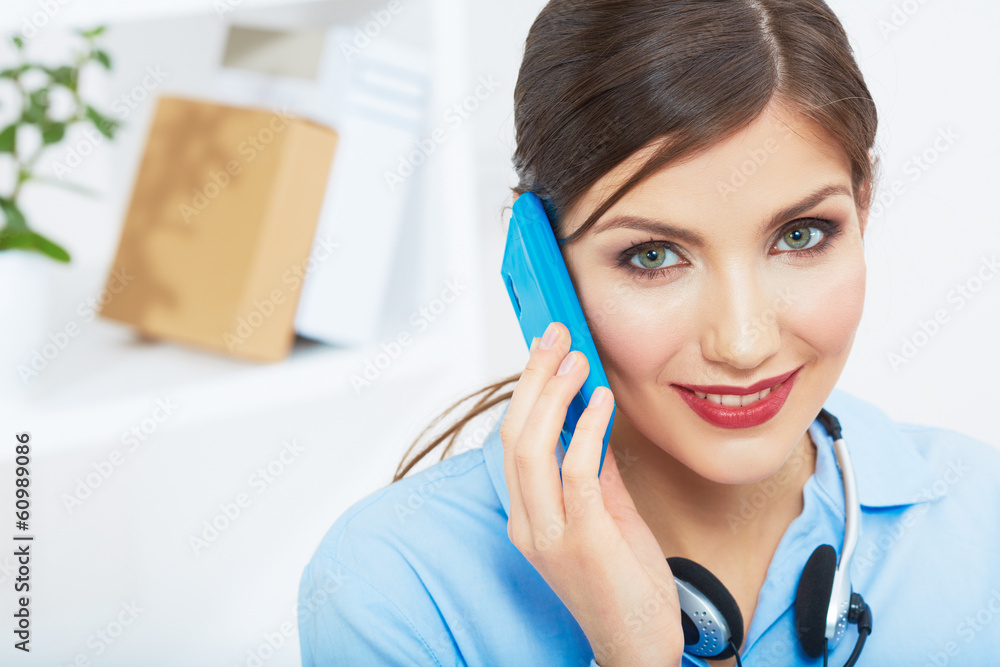 Smiling business woman on phone at office. Close up female port Smiling business woman on phone at office. Close up female port