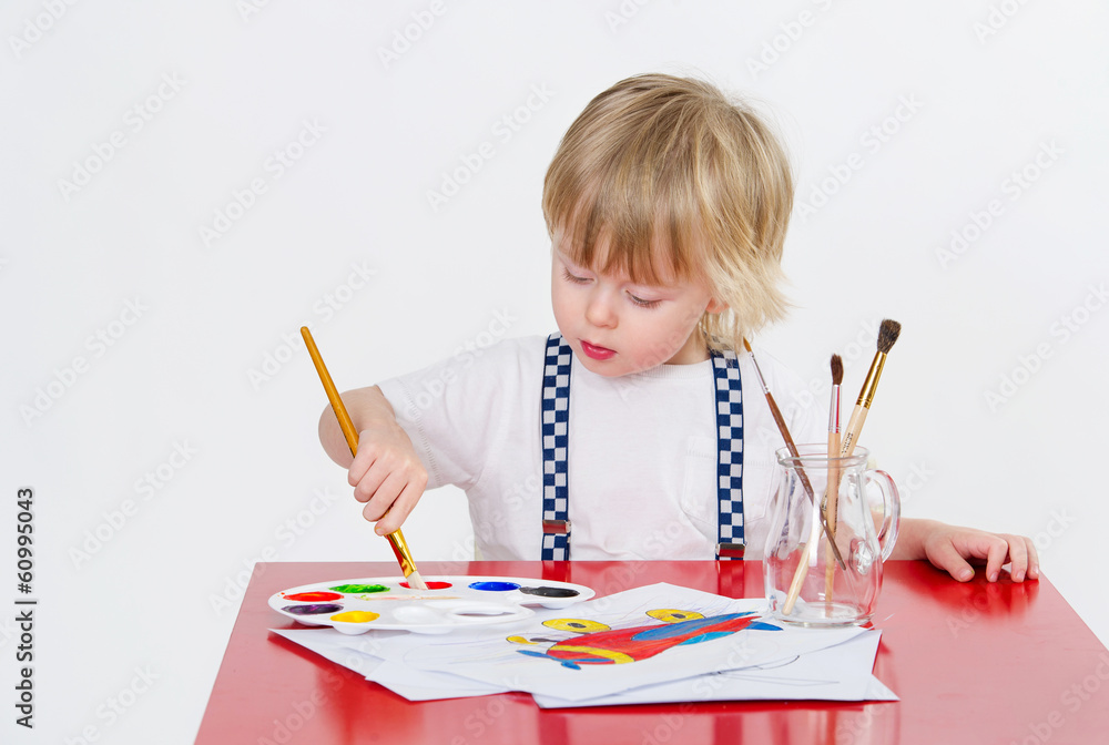 Cute toddler drawing with colorful water painting Cute toddler drawing with colorful water painting