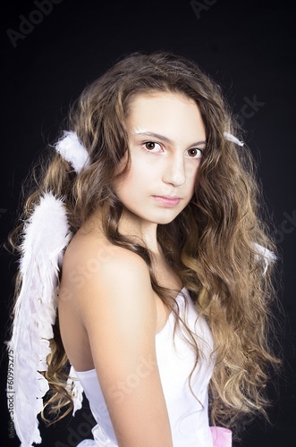 Fototapeta Naklejka Na Ścianę i Meble -  beautiful girl in angel costume