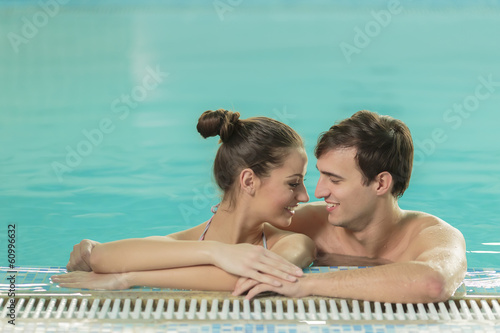 Young couple in the swimmin...
