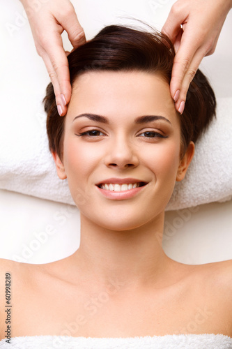 Face Massage. Close-up of a Young Woman Getting Treatment in Spa