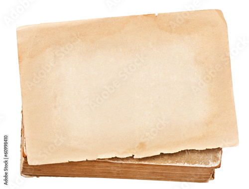 old paper and book isolated on white background