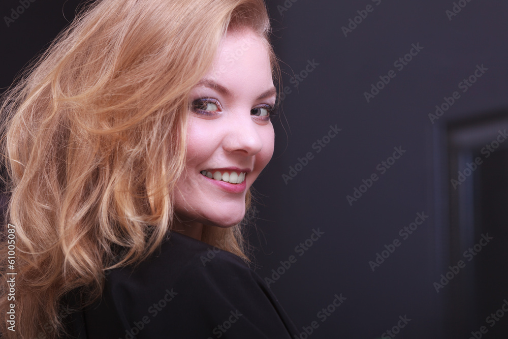 Girl with blond wavy hair by hairdresser in beauty salon Girl with blond wavy hair by hairdresser in beauty salon