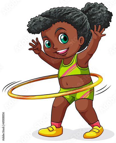 A young black girl playing with the hulahoop