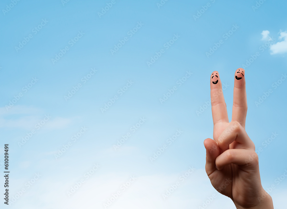Happy smiley fingers looking at clear blue sky copyspace Happy smiley fingers looking at clear blue sky copyspace