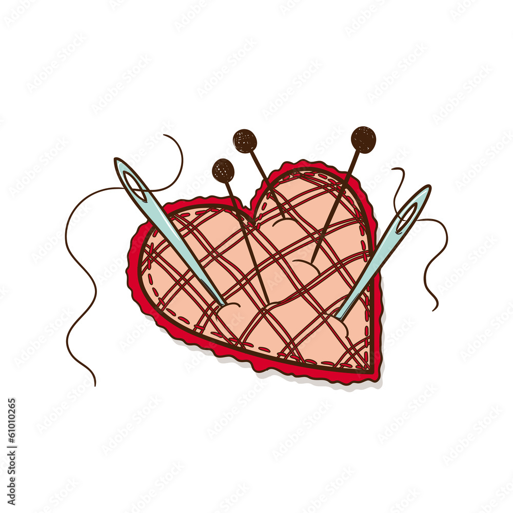 Pin cushion in a heart shape.