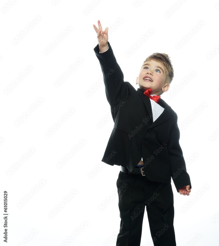Little boy in hat and black suit isolated on white background Little boy in hat and black suit isolated on white background
