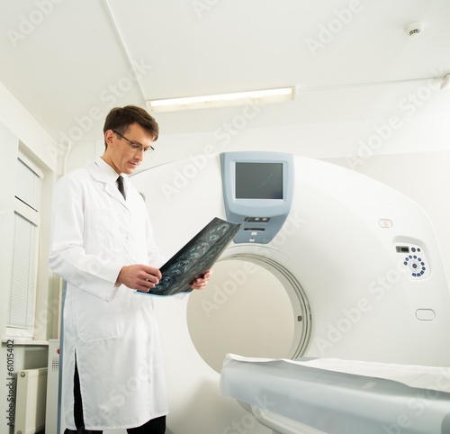 Doctor looking at the computed tomography results