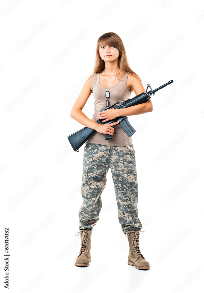 Soldier young beautyful girl dressed in a camouflage with a gun Soldier young beautyful girl dressed in a camouflage with a gun