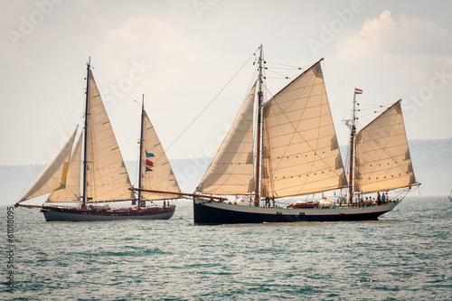 Two old ships sailing in the sea