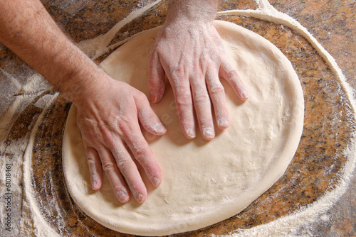 Chef Preparing pizza dough