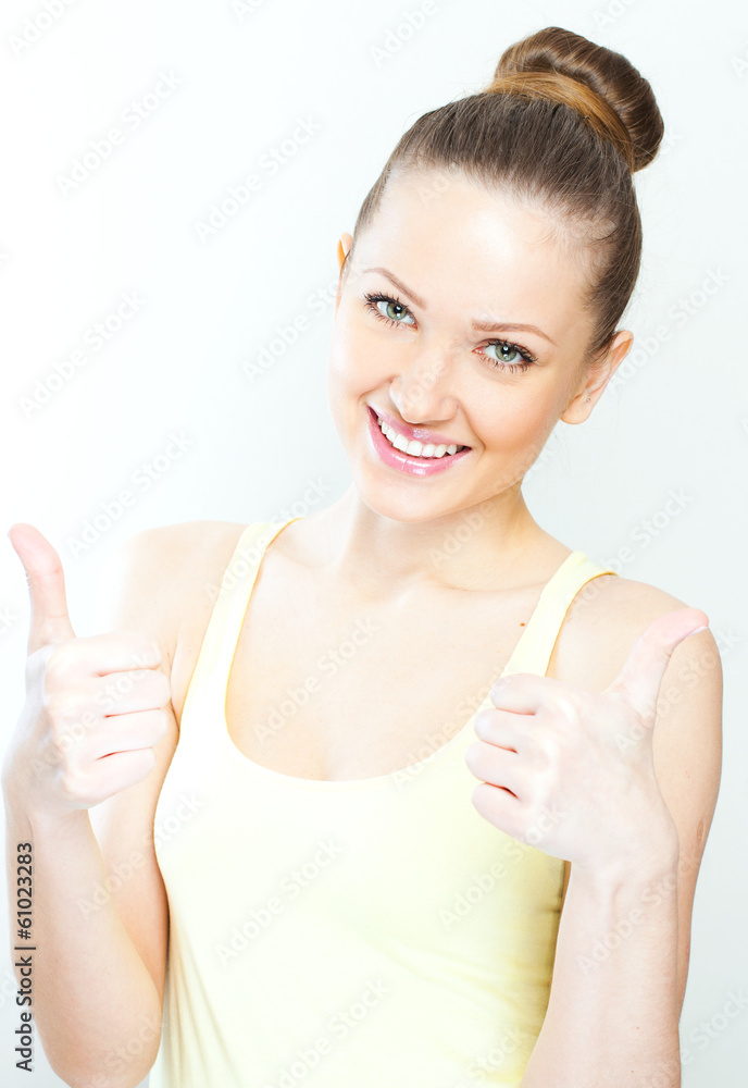 Pretty girl gives thumb up, isolated on white Pretty girl gives thumb up, isolated on white