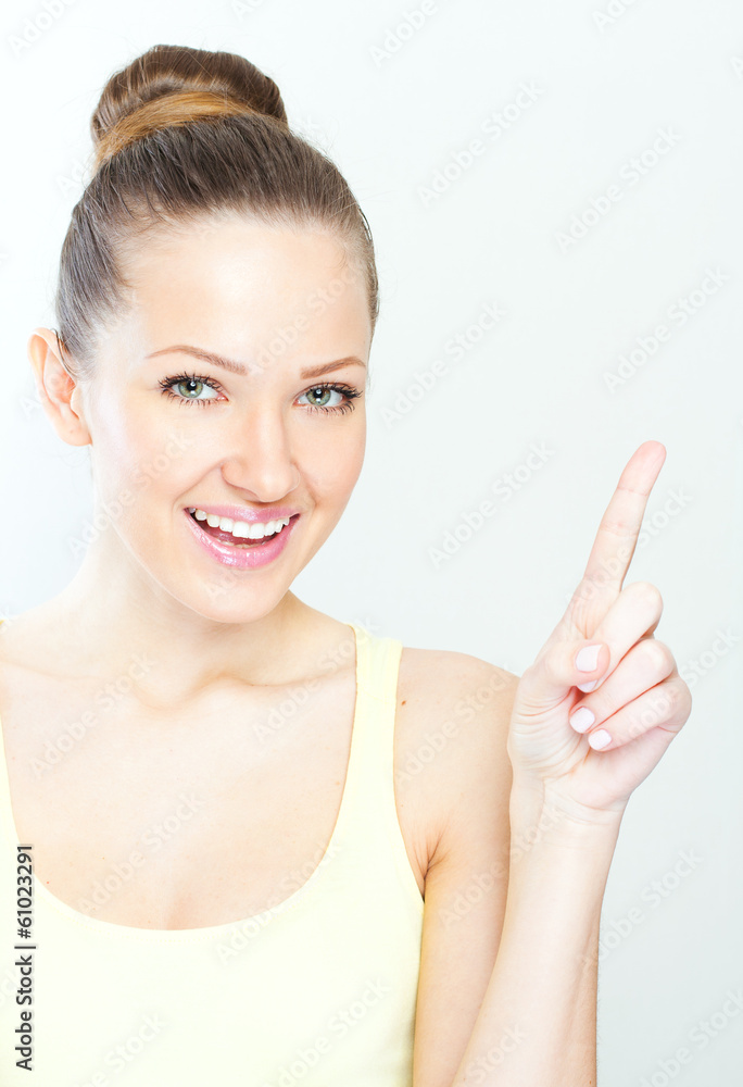 smiling woman pointing on an idea. beautiful woman. smiling woman pointing on an idea. beautiful woman.