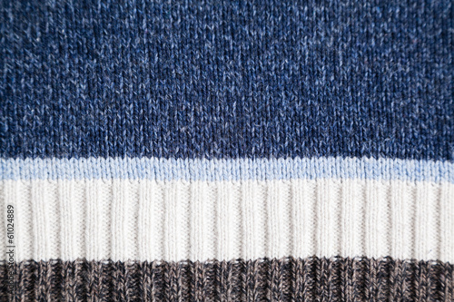 blue woolen fabric with stripes and selective focus