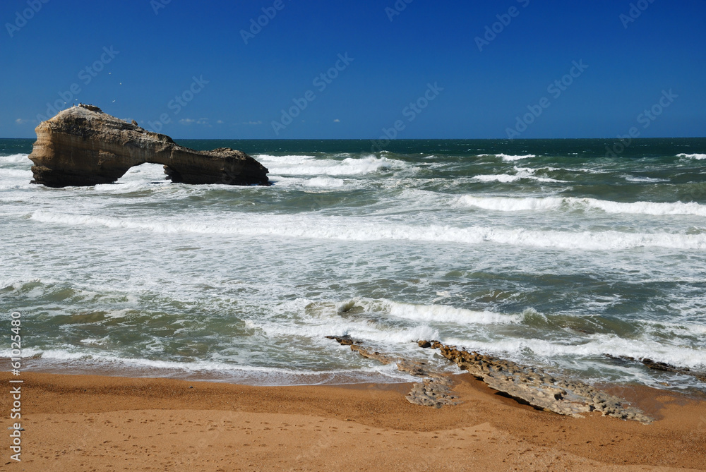 Ocean waves running on sand coast at the time of ebb. Ocean waves running on sand coast at the time of ebb.