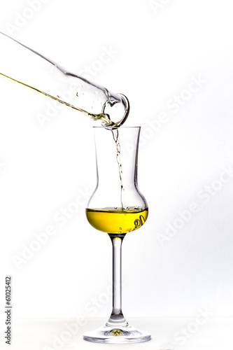 Pouring the Grappa into a glass