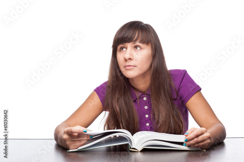 thoughtfull girl with book