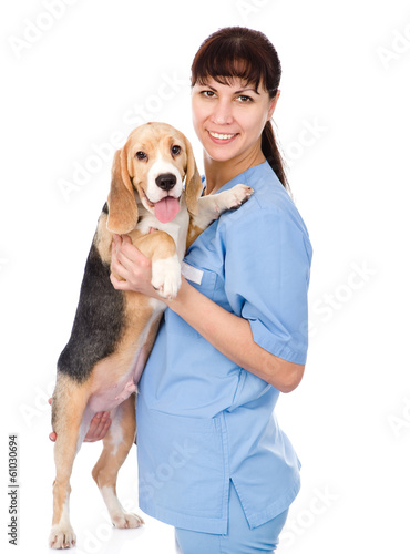 Portrait of a veterinarian with a dog. isolated on white 