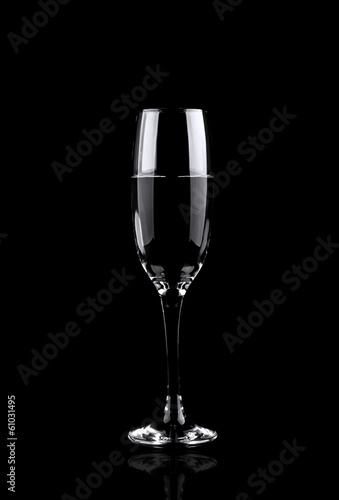 Wine glass silhouette on black background. Vertical photo.