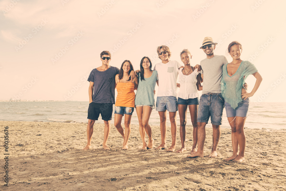 Obraz premium Multiethnic Group of Friends at Beach