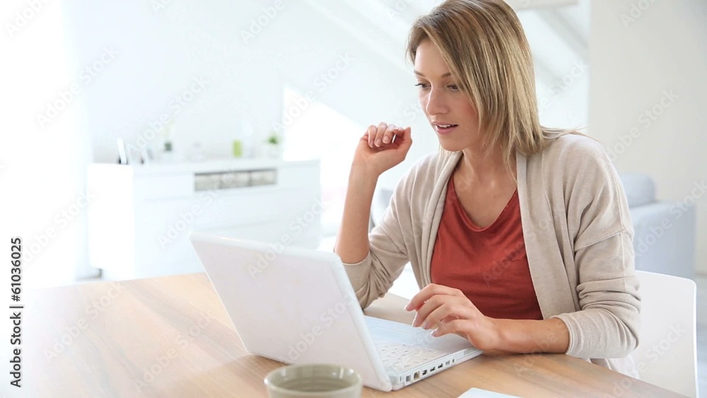 Businesswoman working from home in laptop computer Businesswoman working from home in laptop computer