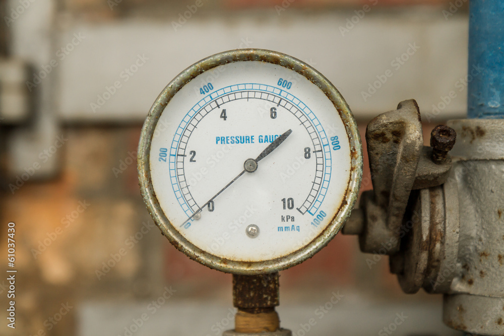 Pressure Gauge connected to Pipes Stock Photo | Adobe Stock