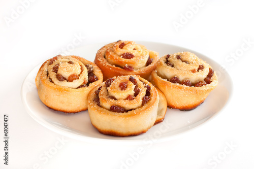 Group of delicious swirl buns with raisins and brown sugar