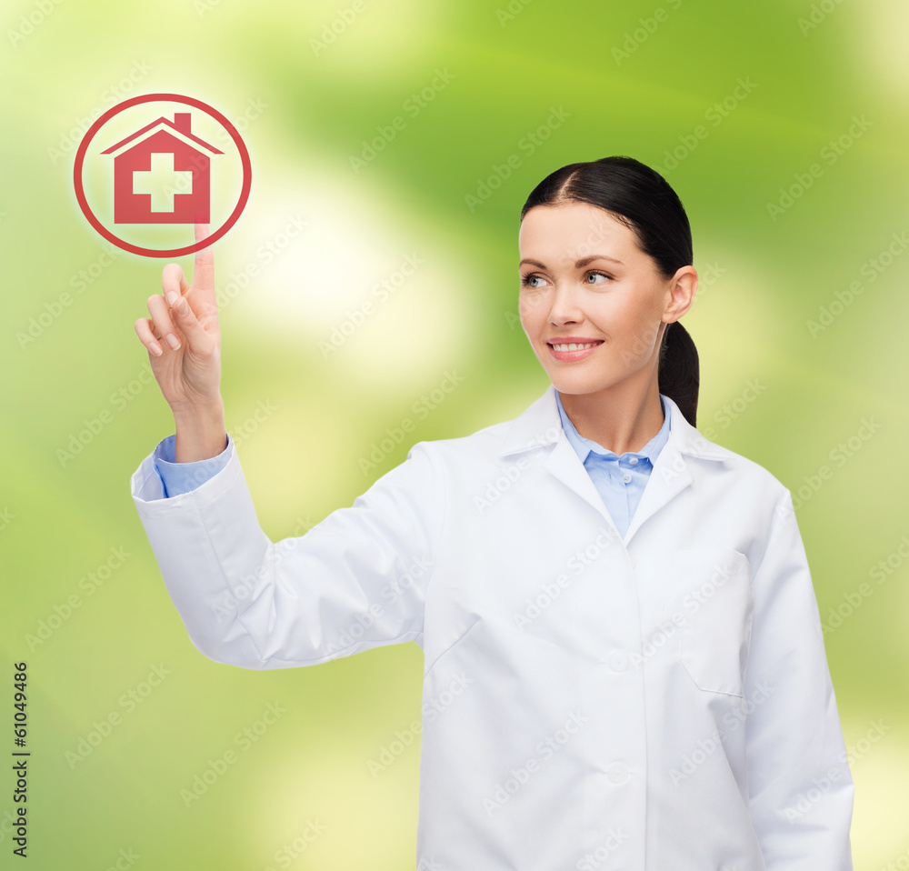 smiling female doctor pointing to hospital sign smiling female doctor pointing to hospital sign