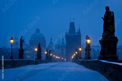 Tablou canvas Famous Prague Charles bridge empty at early morning blue hour