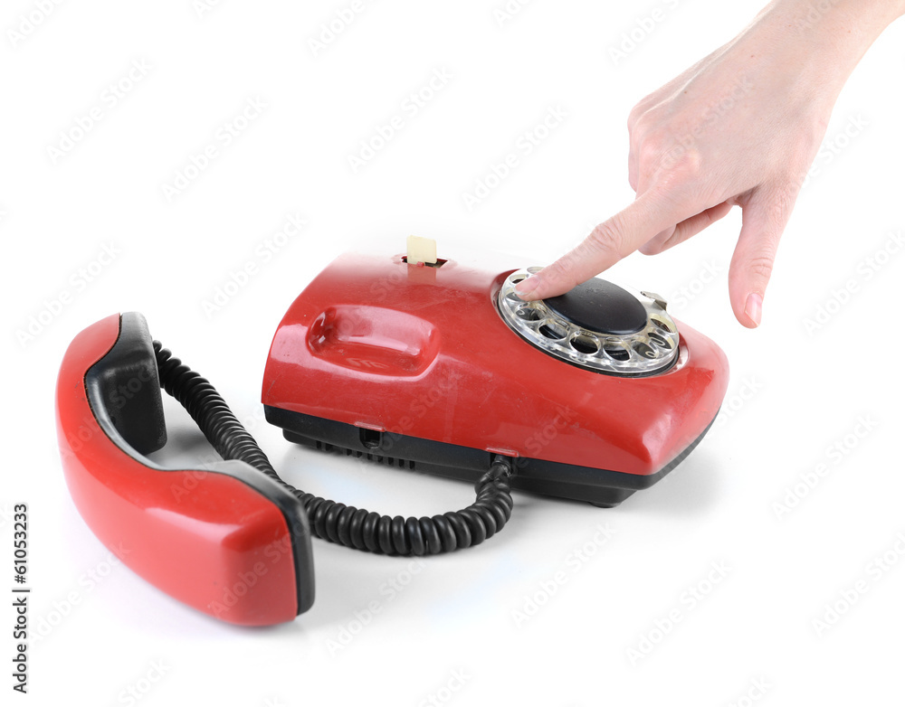 Fototapeta Red retro telephone,  isolated on white