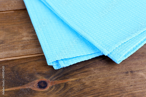 Kitchen towels on wooden background