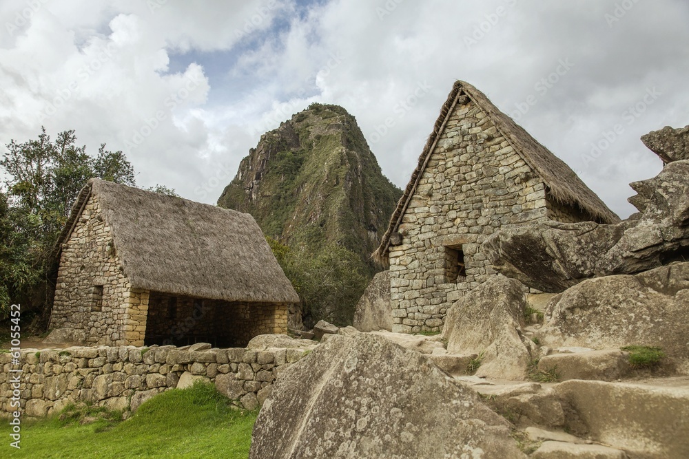 Ruins of two houses and Wayna Picchu in Machu Picchu Ruins of two houses and Wayna Picchu in Machu Picchu