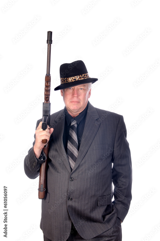 Gangster with submachine gun isolated on white Gangster with submachine gun isolated on white