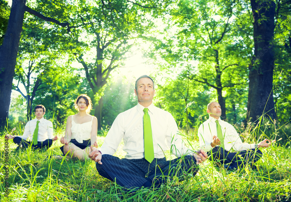 Business People Meditating in Nature Business People Meditating in Nature