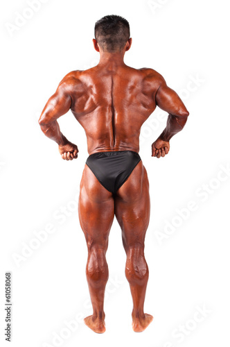 Bodybuilder posing on a white background