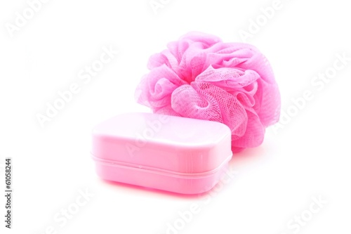 Obraz na plátne pink soapbox and shower scrubber on white background