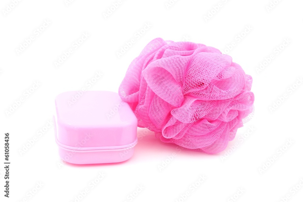 pink soapbox and shower scrubber on white background pink soapbox and shower scrubber on white background