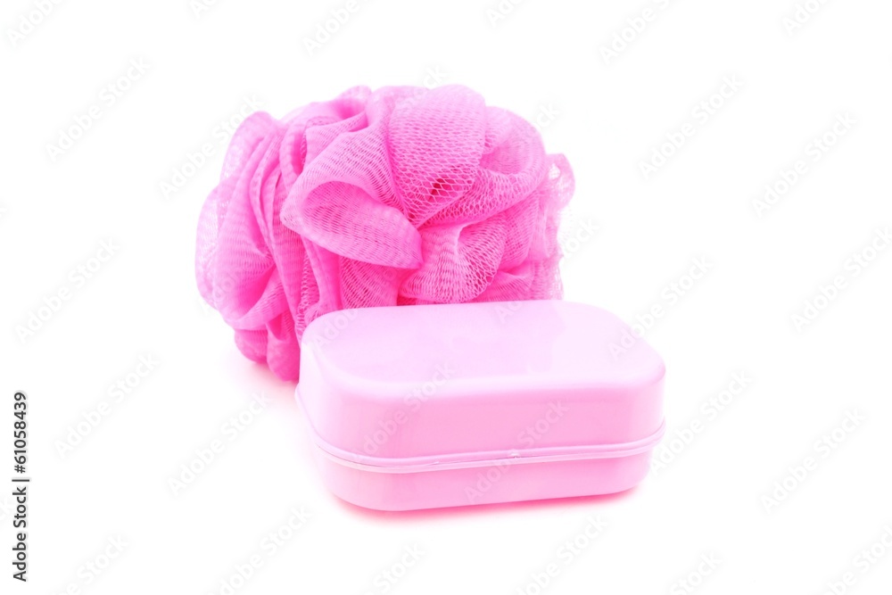 pink soapbox and shower scrubber on white background pink soapbox and shower scrubber on white background