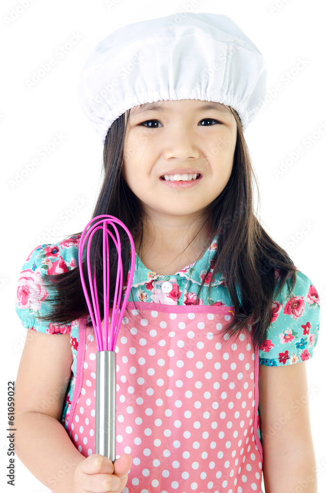 Little asian girl with kitchen ware concept Little asian girl with kitchen ware concept