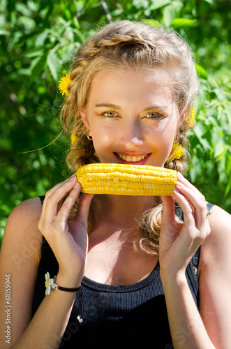 woman eating corn-cob
