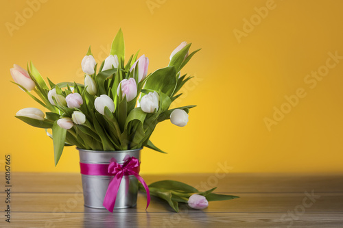 Fototapeta Naklejka Na Ścianę i Meble -  Bright tulips in decorative pot