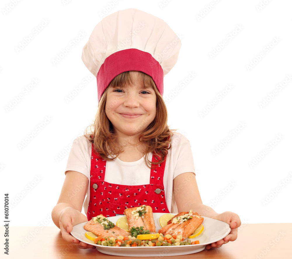 happy little girl cook with salmon seafood happy little girl cook with salmon seafood
