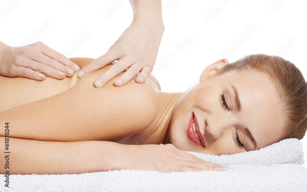 Beautiful caucasian woman lying and relaxing at spa saloon, havi Beautiful caucasian woman lying and relaxing at spa saloon, havi