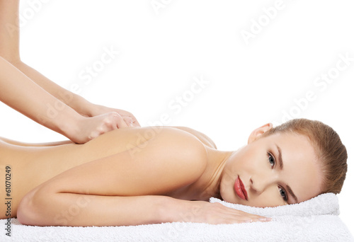 Beautiful caucasian woman lying and relaxing at spa saloon, havi